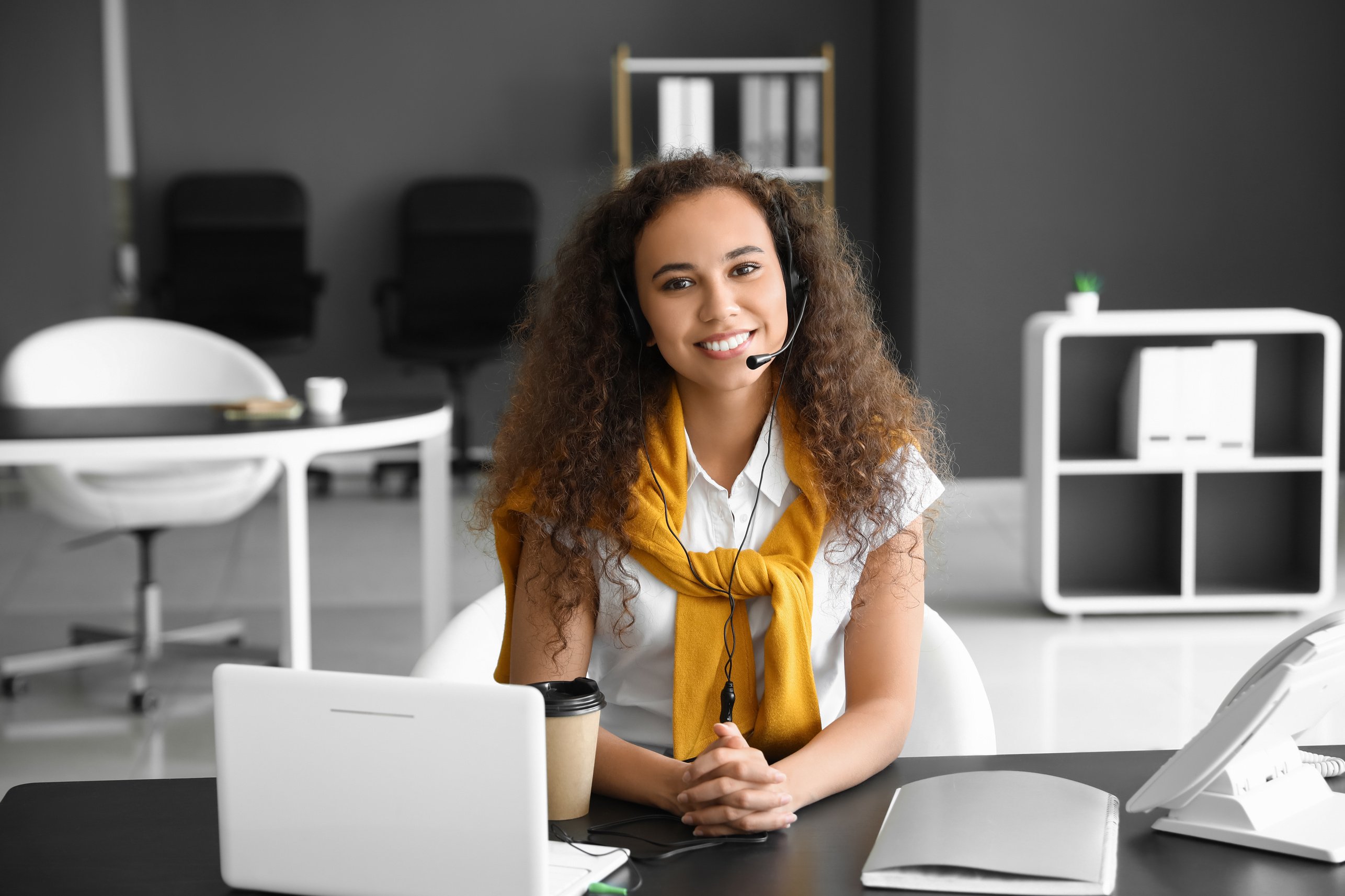 African-American Consultant of Call Center Working in Office